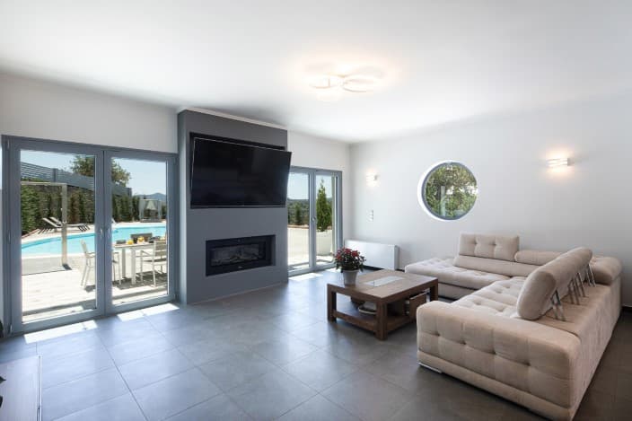 Living room and open-plan interior at Five Stars Villa, Kommeno, Corfu